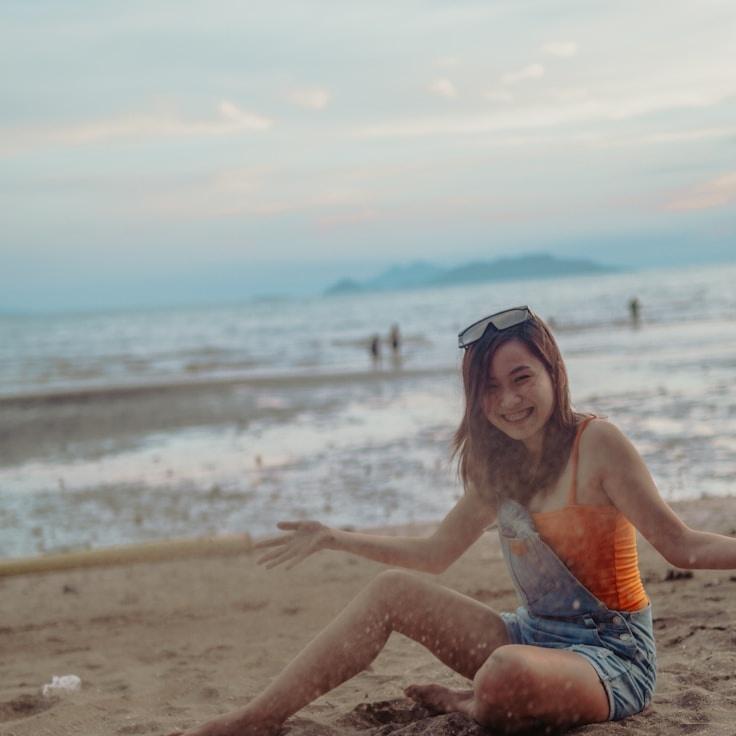 Alex Rivera, Lead Design Curator at Grove Pebble Quay, reviewing corporate floral arrangements
