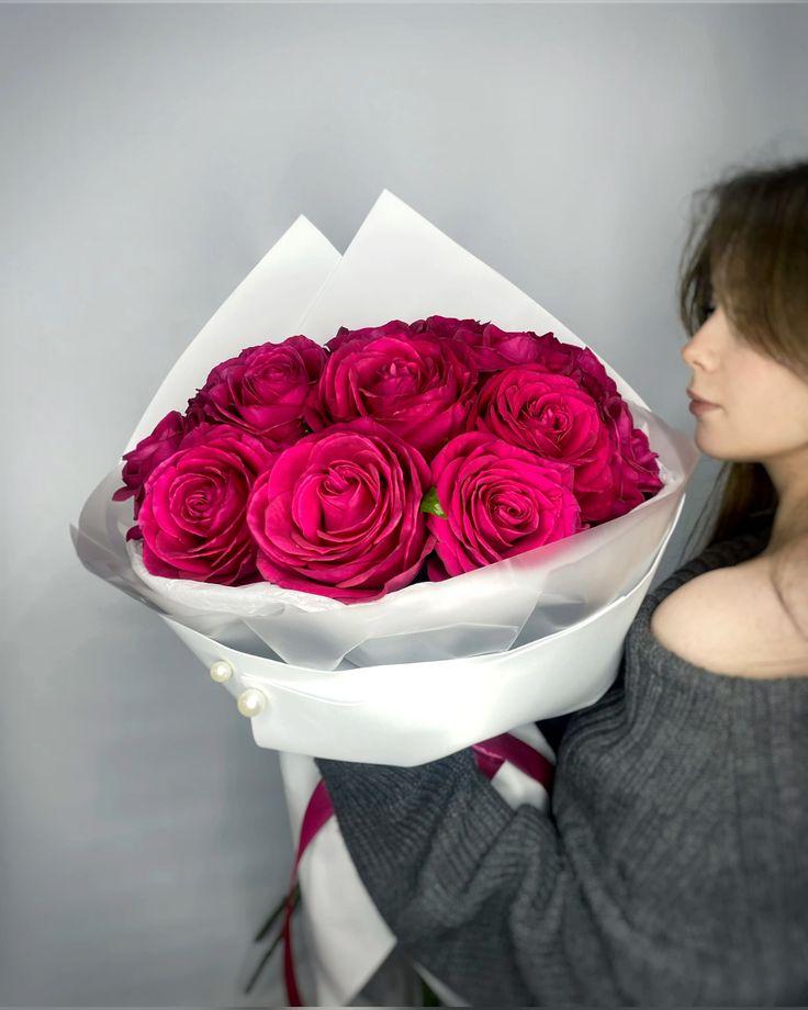 Professional floral arrangement in modern corporate setting